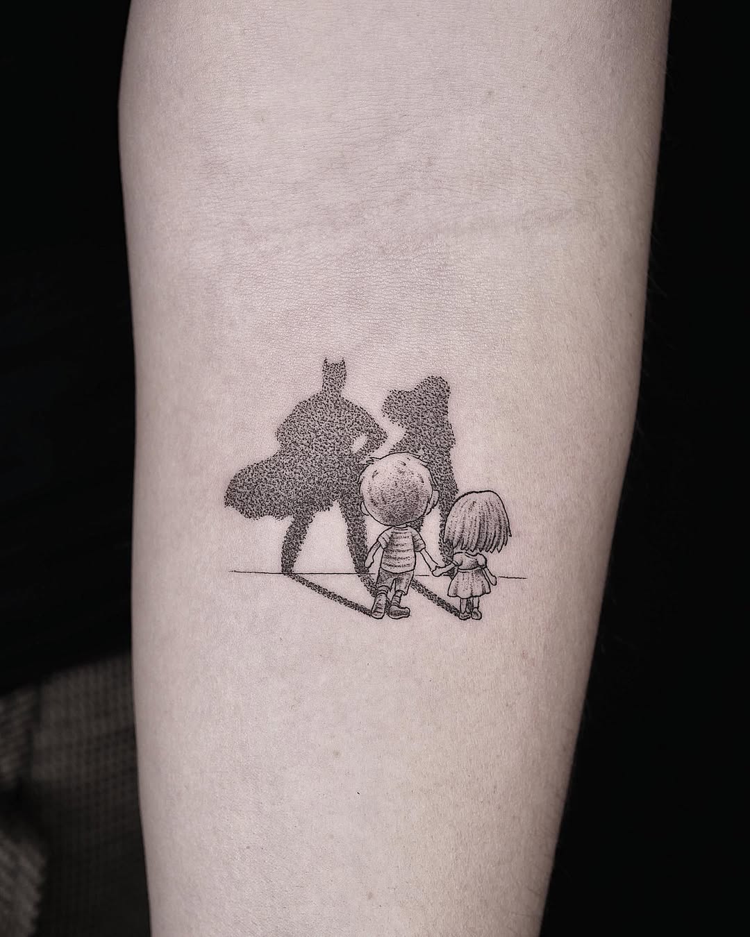 Powerful sibling bond reflected in ink.