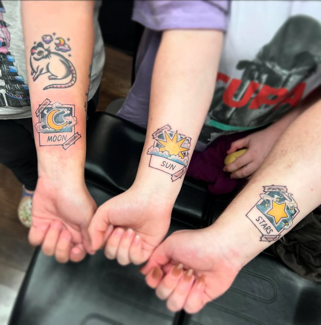 Meaningful sibling tattoos showcasing celestial symbols