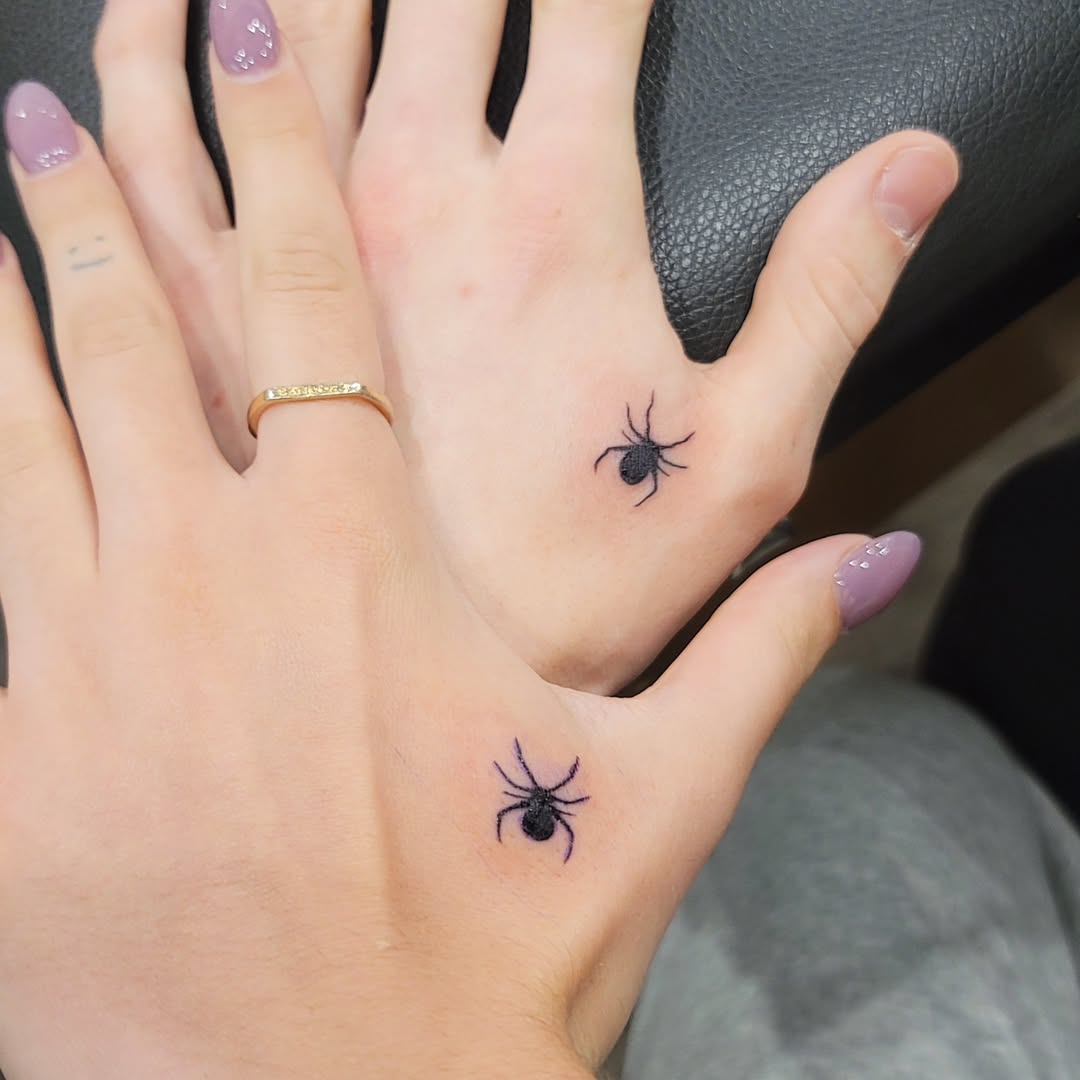 Matching spider tattoos for twin connection