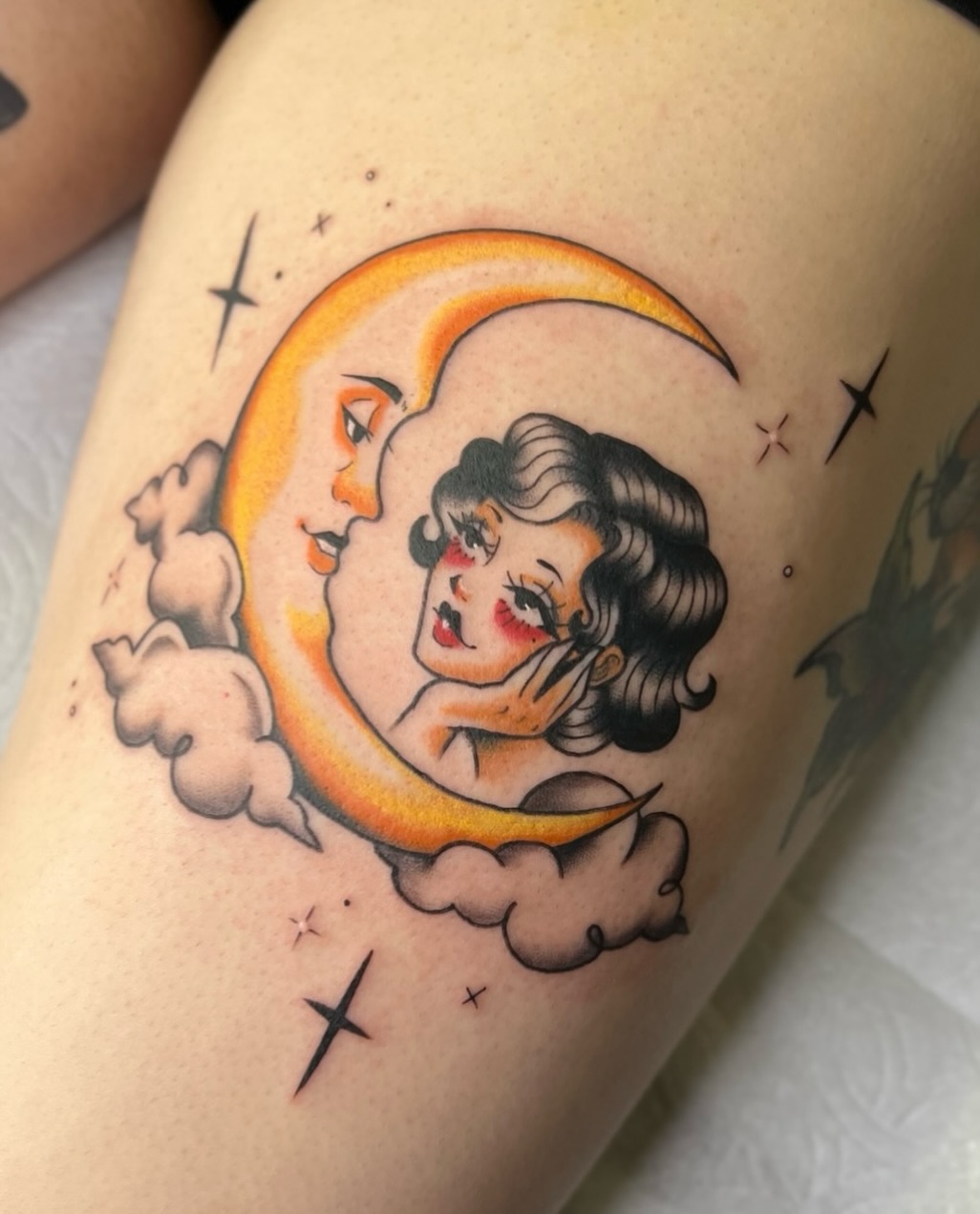 Vintage-style moon and woman tattoo design