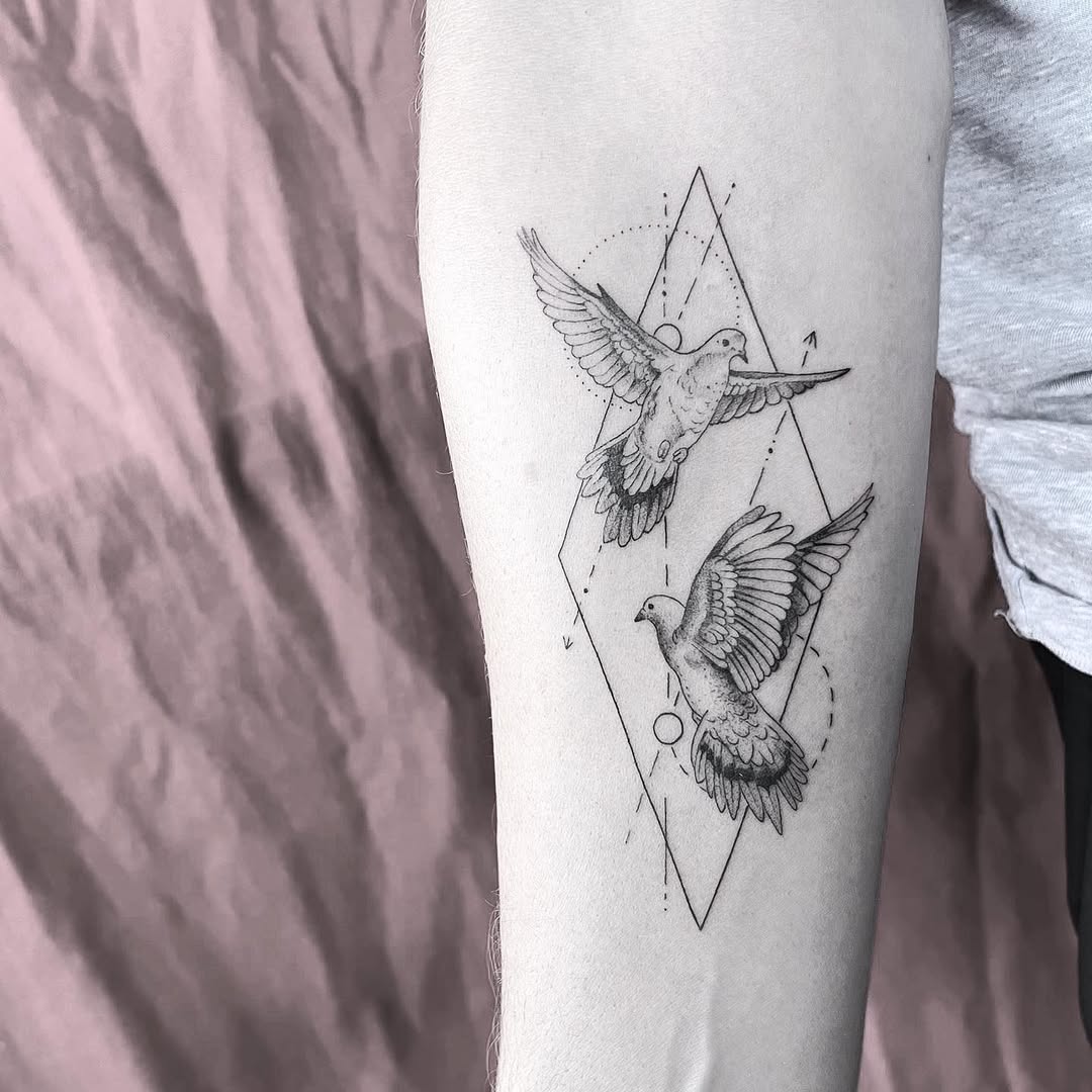 Elegant birds tattoo with geometric diamond design