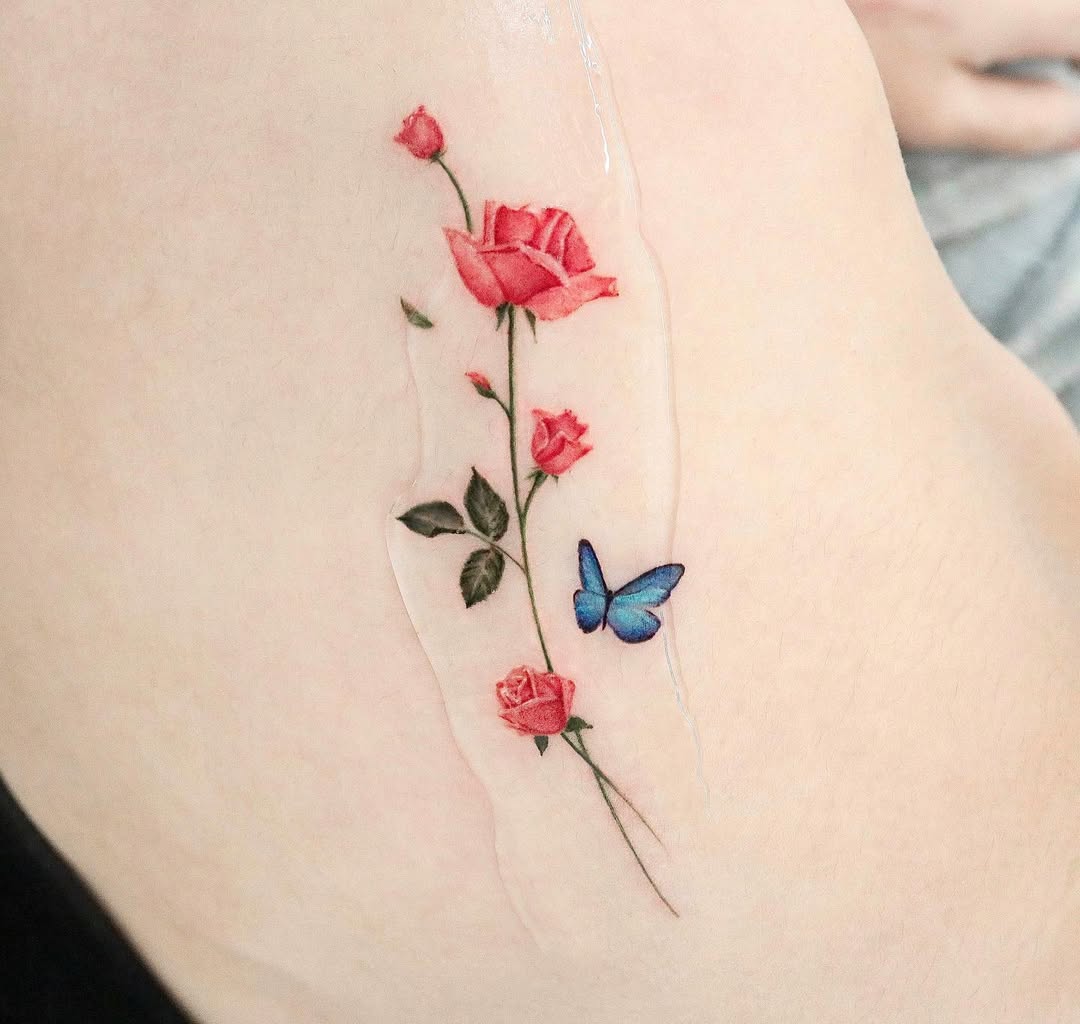 Stunning rose and butterfly tattoo design