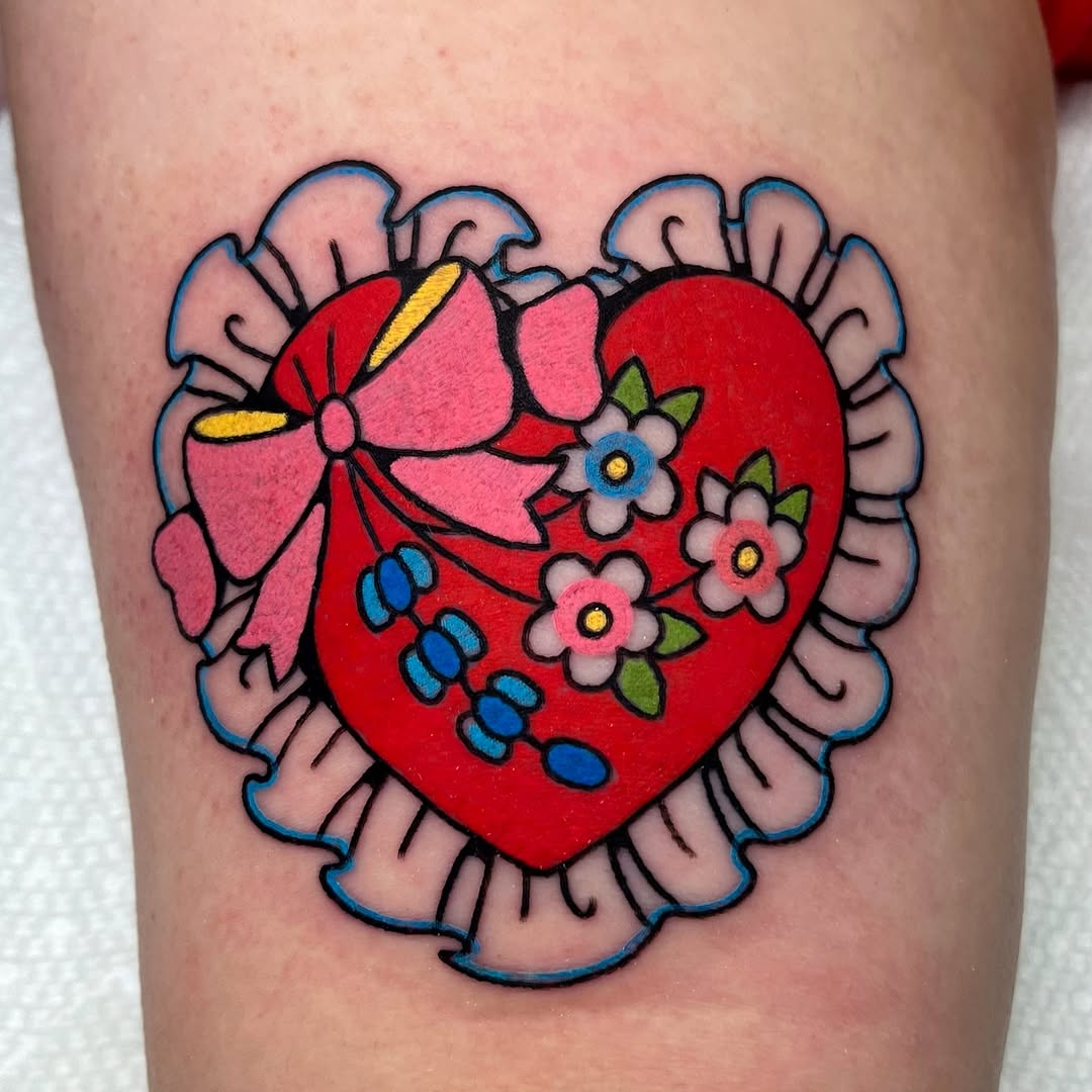 Charming Heart Tattoo with Floral Accents