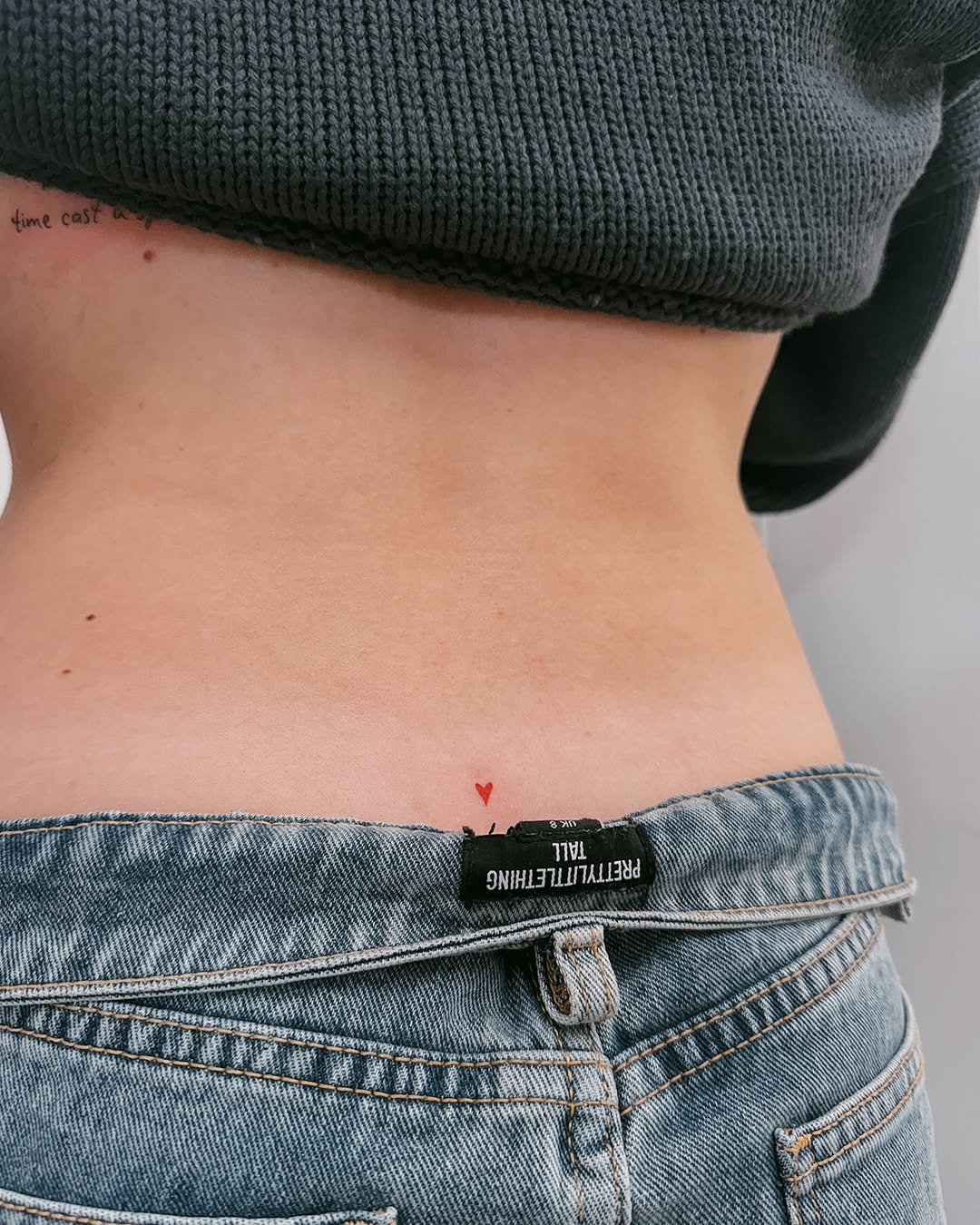 Minimalist tattoo with a heartfelt touch