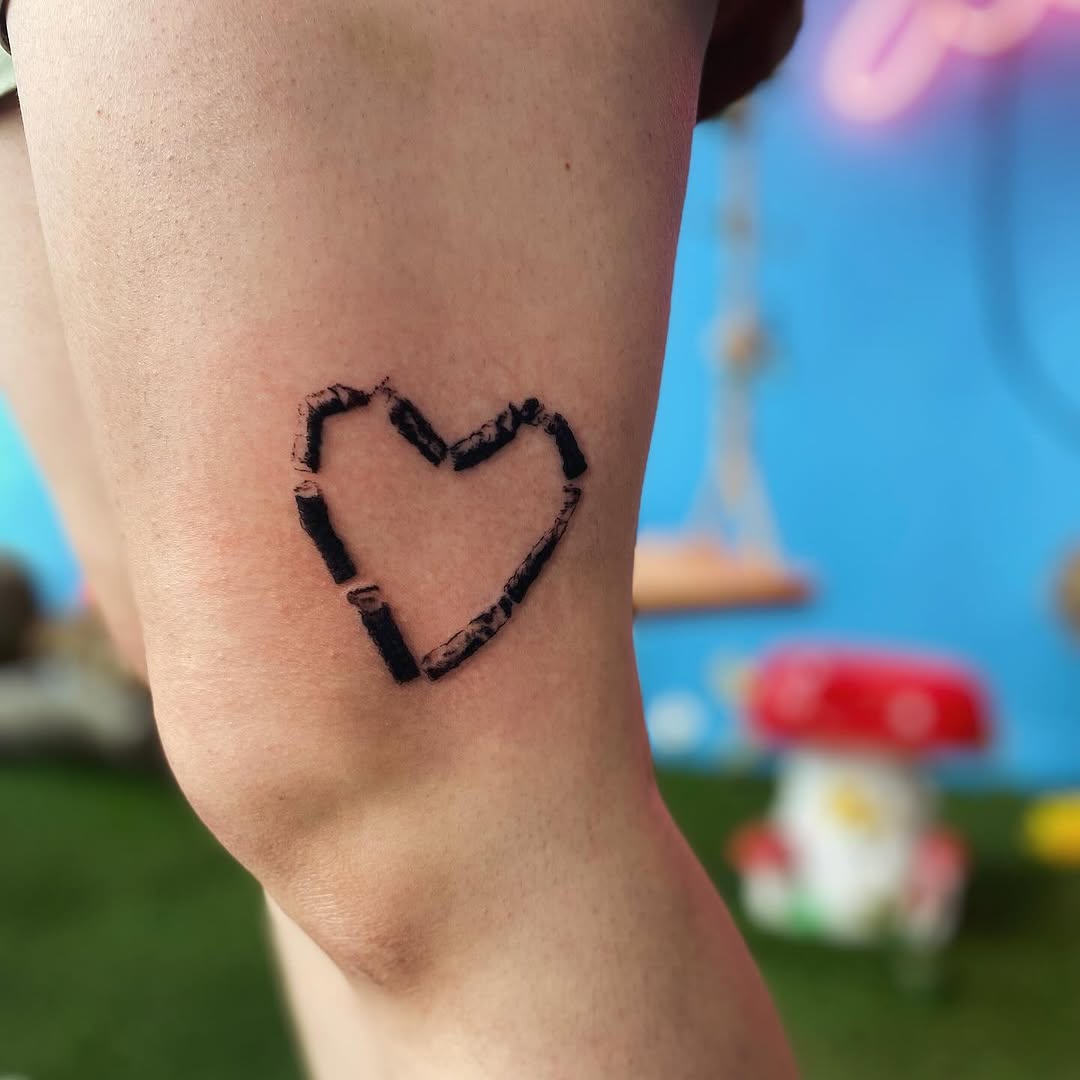 Charming heart tattoo with unique design elements
