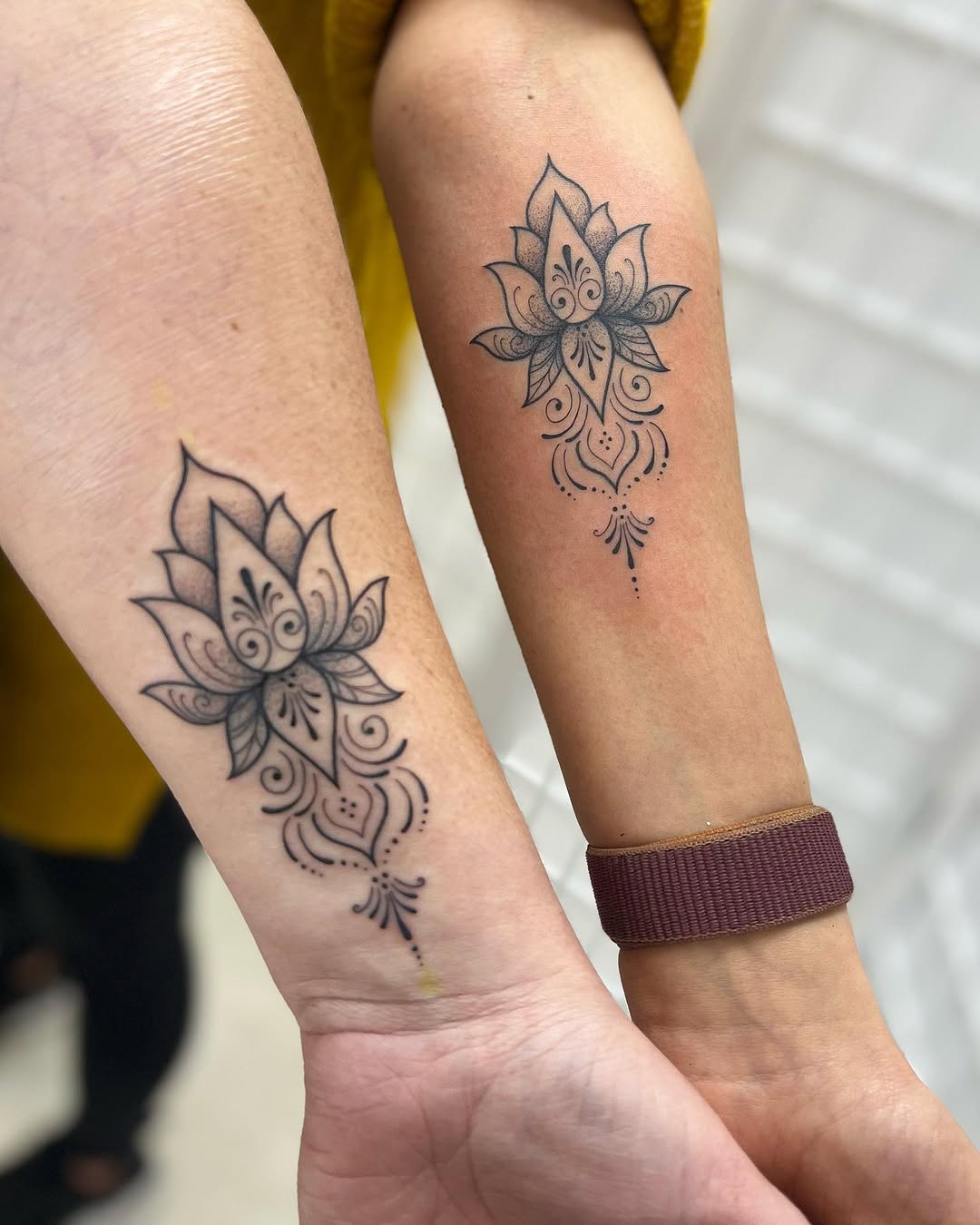 Elegant lotus flower tattoos for best friends