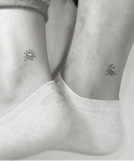 Simple sun and moon matching tattoos for friends