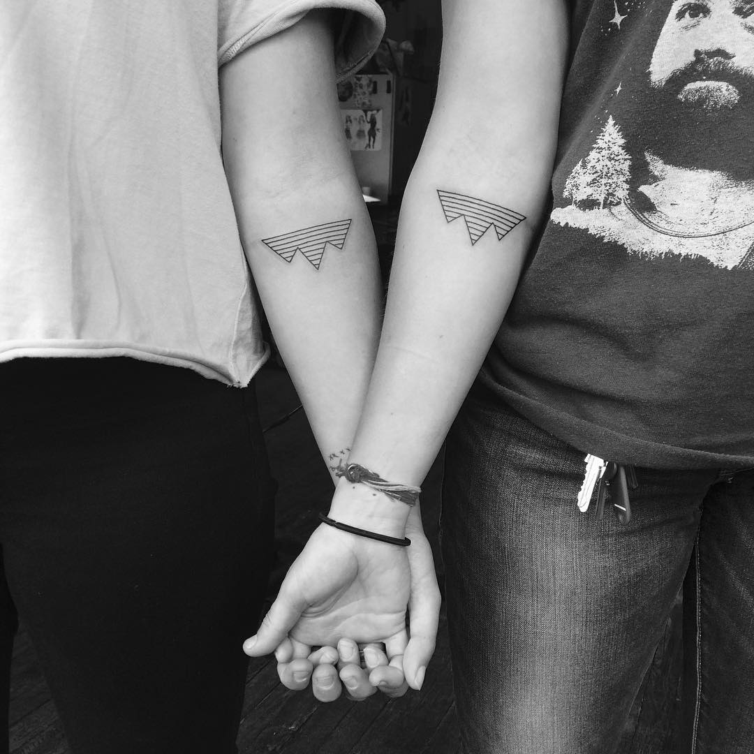 Stylish geometric matching friend tattoos design