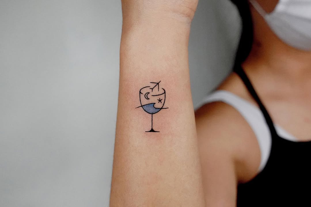Unique airplane cocktail glass tattoo design