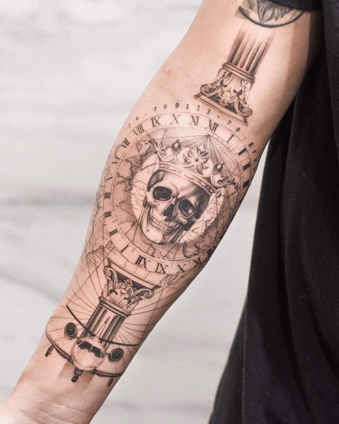 Intricate skull tattoo with airplane elements