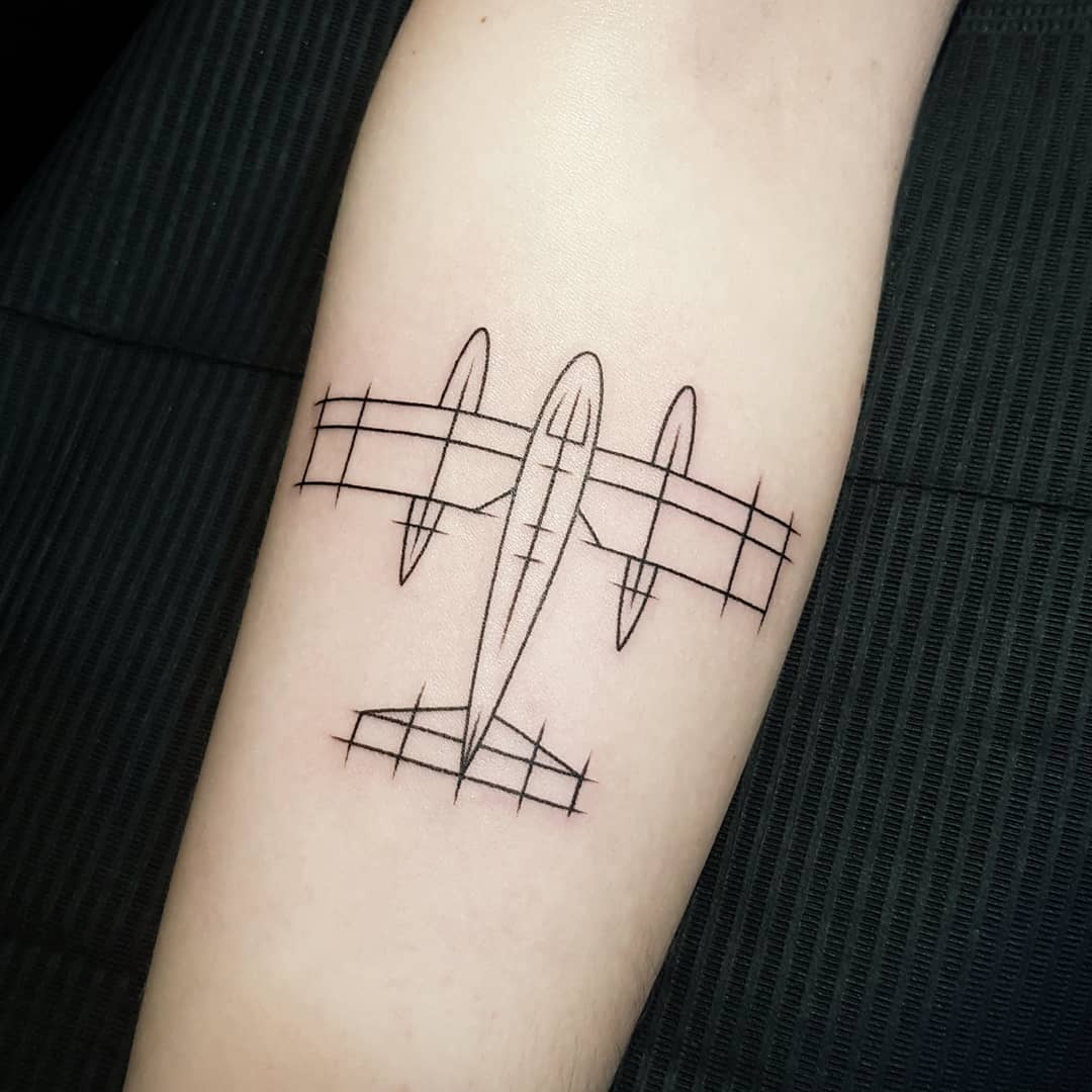 Minimalistic airplane tattoo with unique sketch details