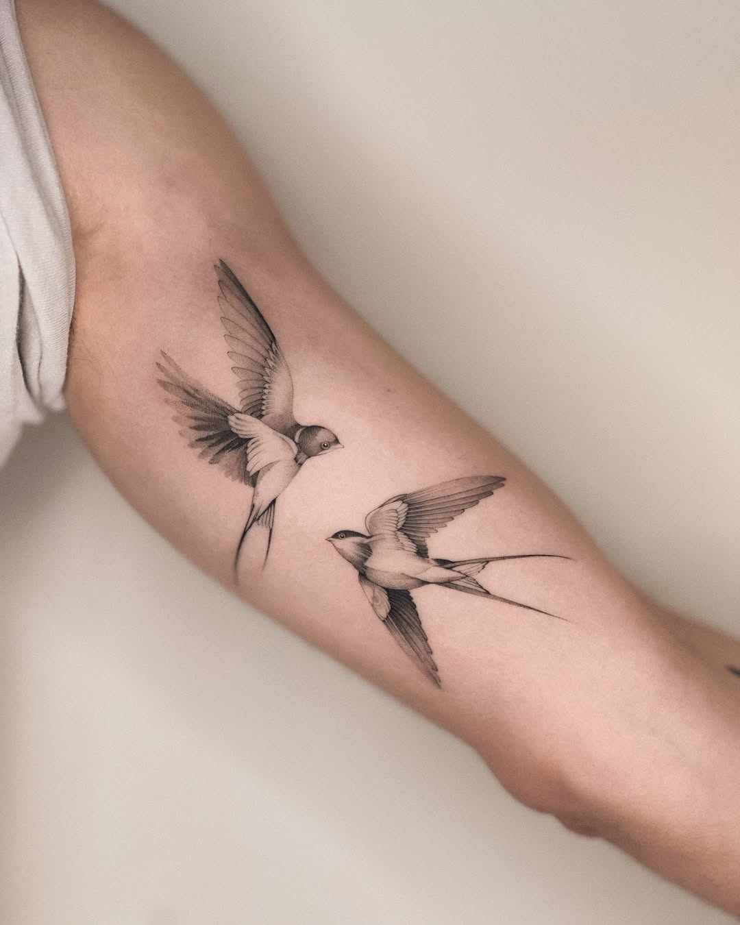 Elegant Swallow Tattoos in Dynamic Flight