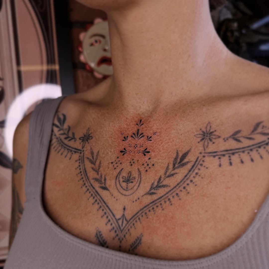 Intricate floral patterns grace the chest