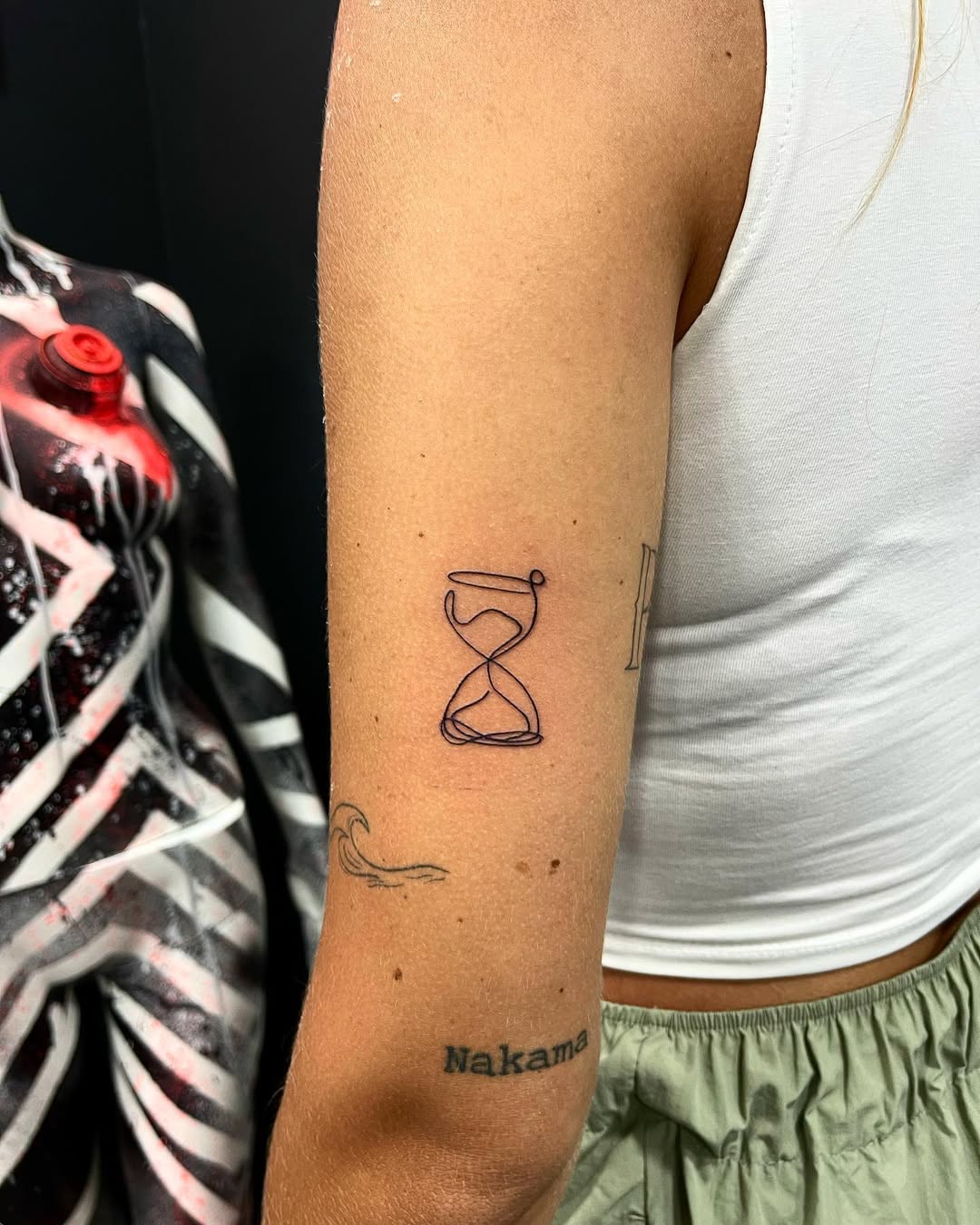 Minimalist hourglass symbolizes time and balance