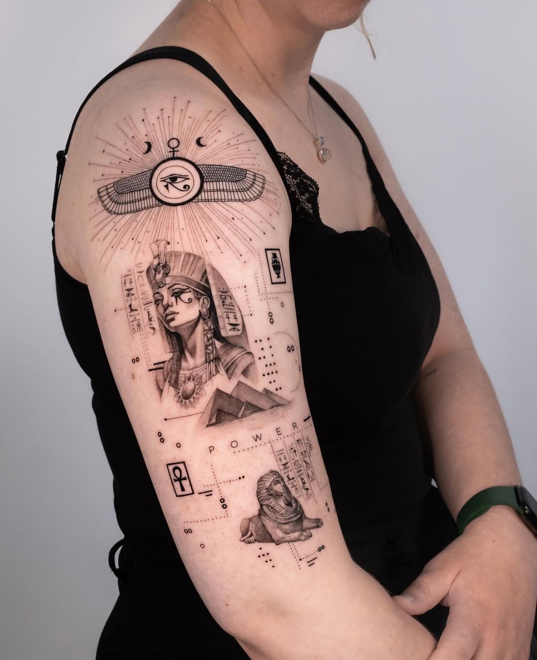 Intricate Egyptian goddess tattoo embodying strength