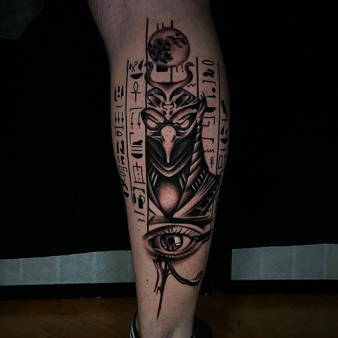 Intricate Egyptian tattoo featuring the Eye of Horus