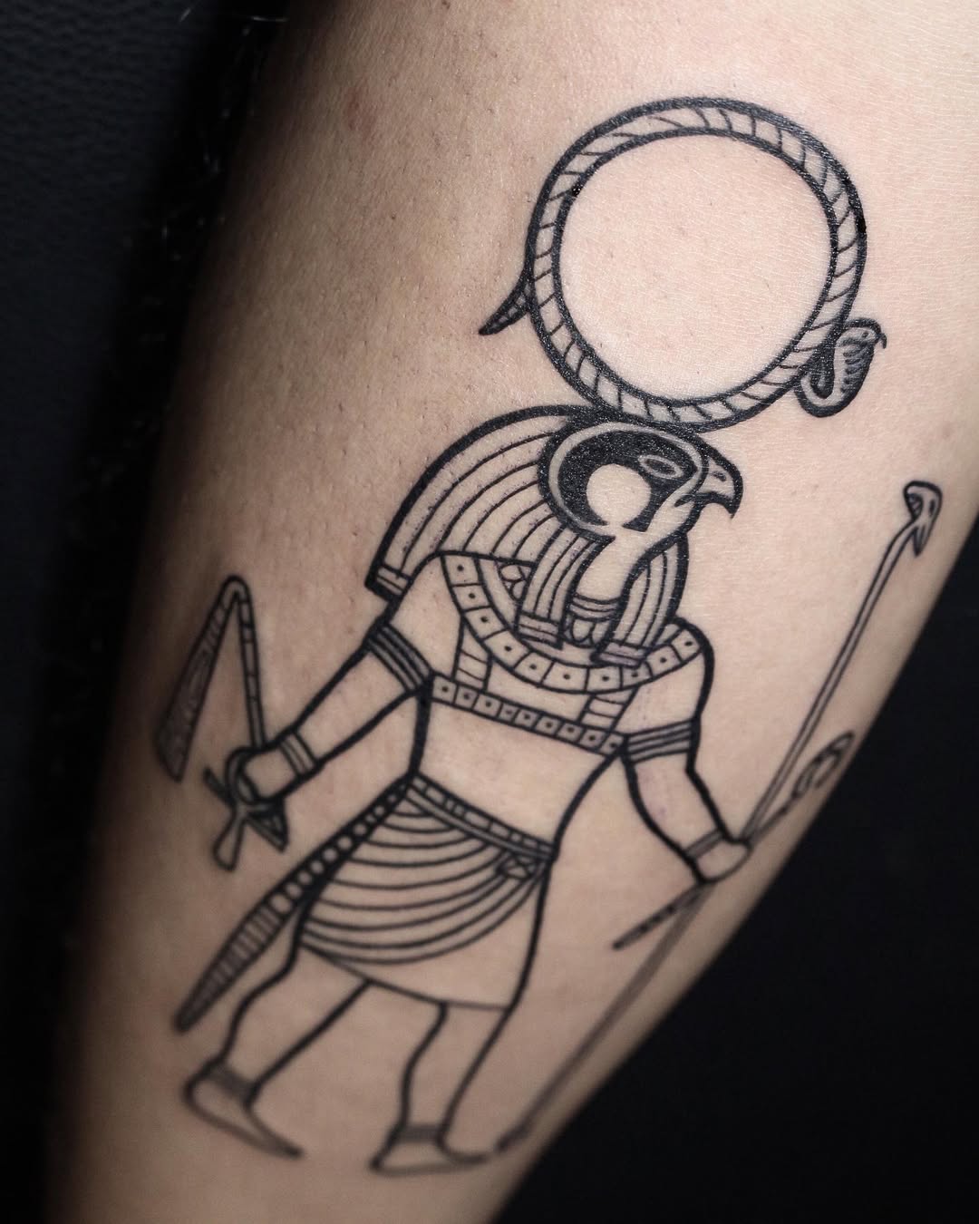 Intricate Egyptian falcon god tattoo design