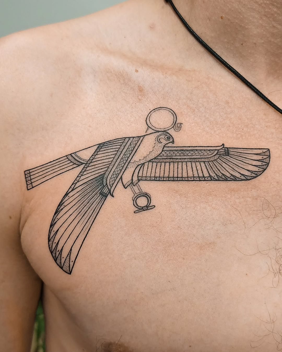 Symbolic Horus Bird Tattoo with Ancient Roots