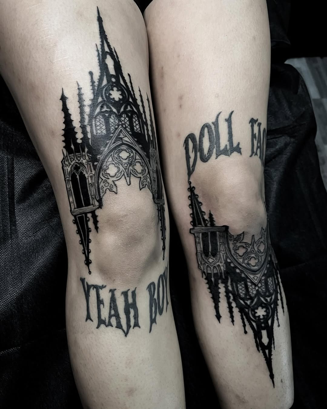 Intricate mansion design on bold knee tattoos