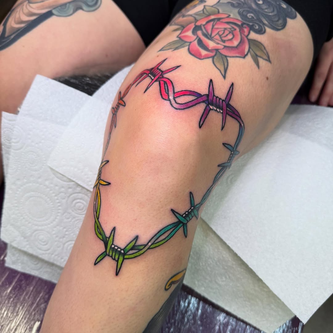 Vibrant Barbed Wire Knee Tattoo Design