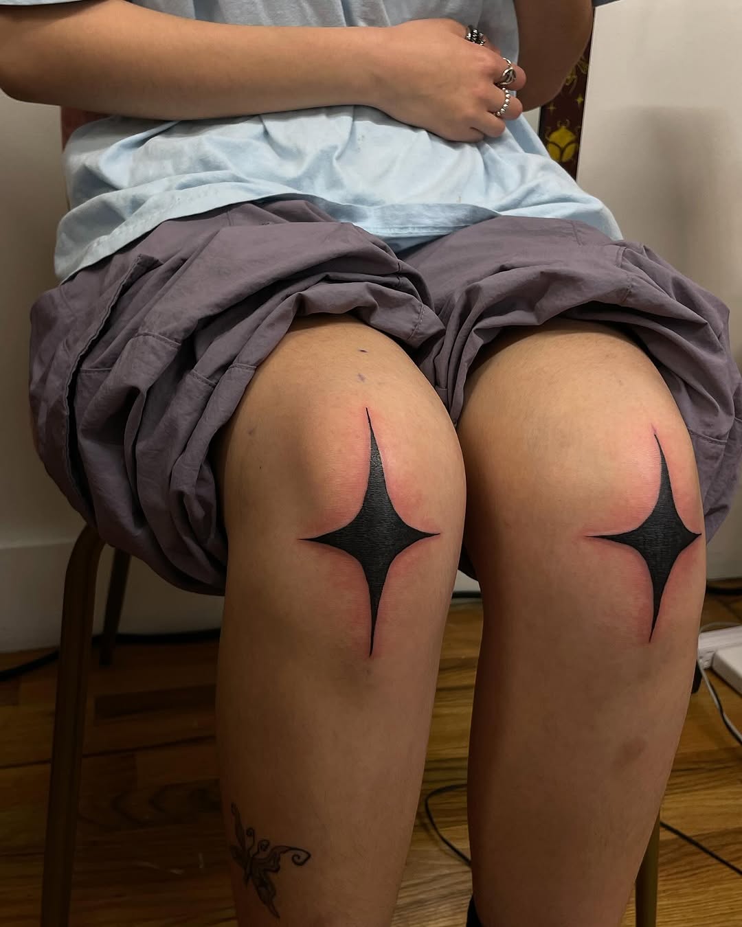 Bold Star Tattoos on Knee Caps