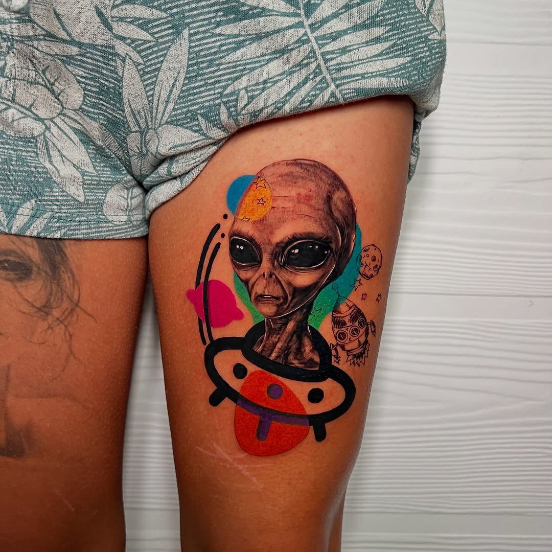 Colorful extraterrestrial tattoo with bold expression