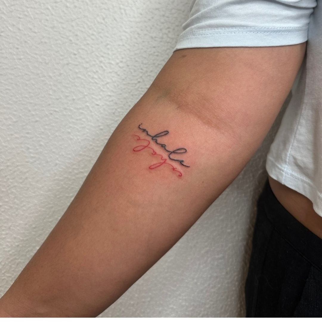 Black and red Inhale exhale tattoo