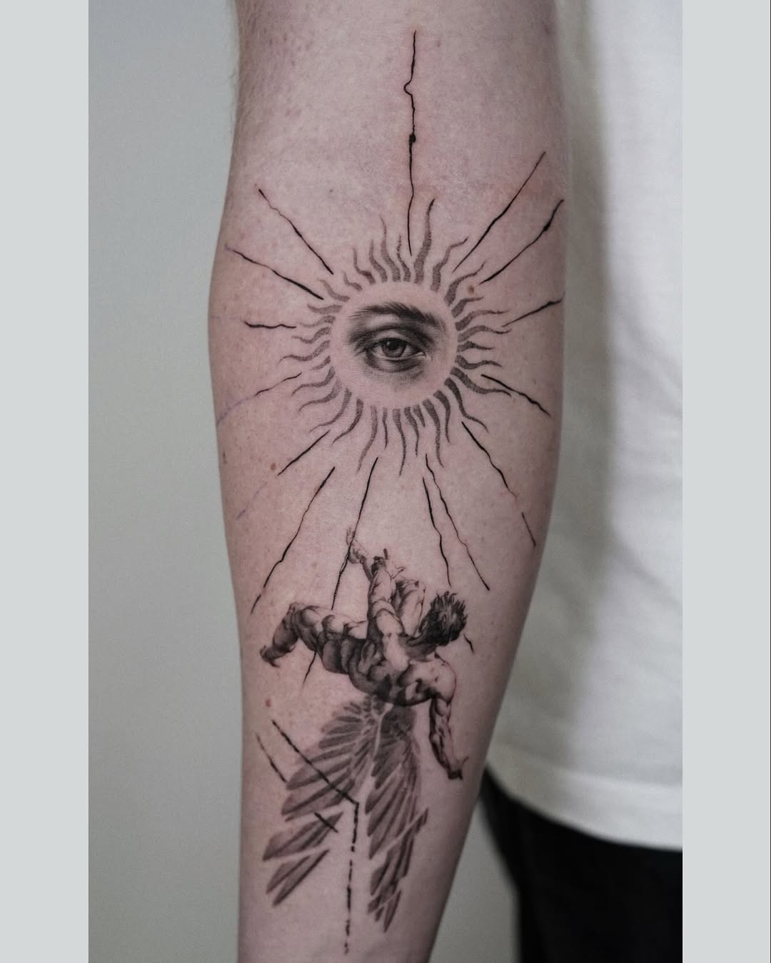 Intricate eye tattoo with celestial elements