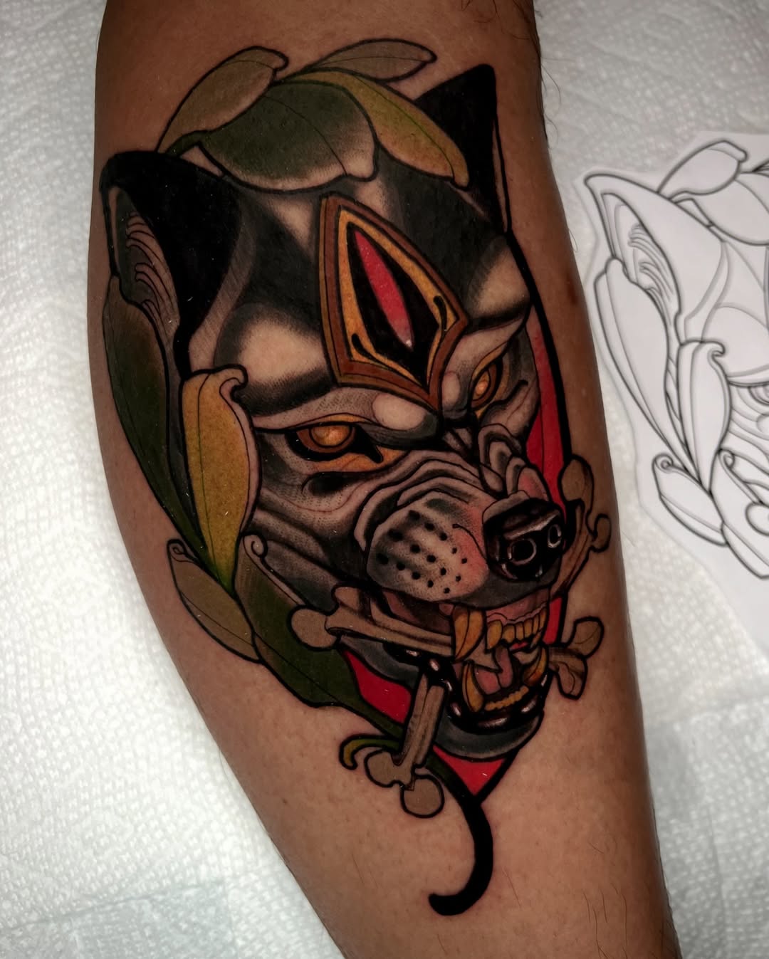 Bold wolf tattoo with vibrant colors and details