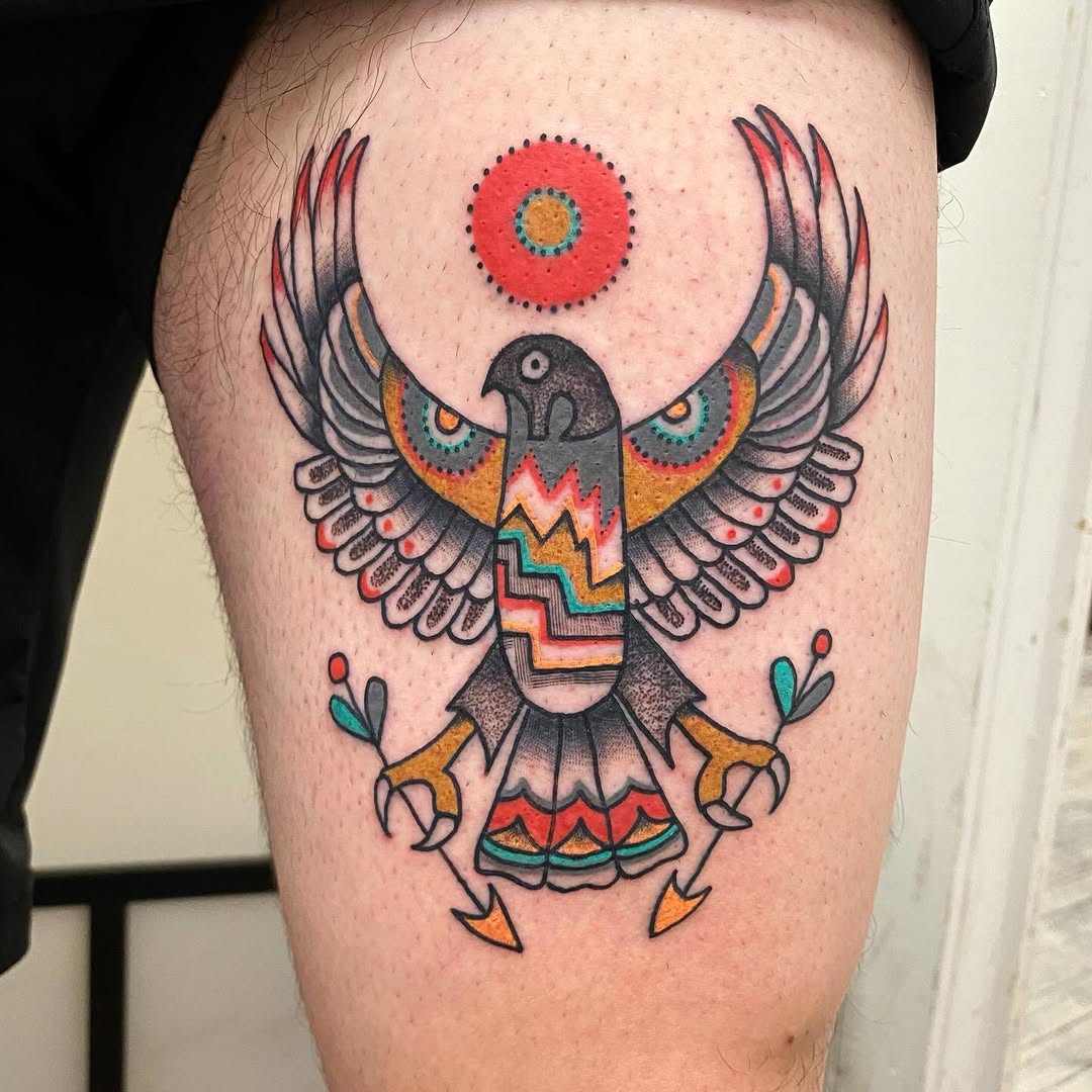 Vibrant Hawk Tattoo with Tribal Elements