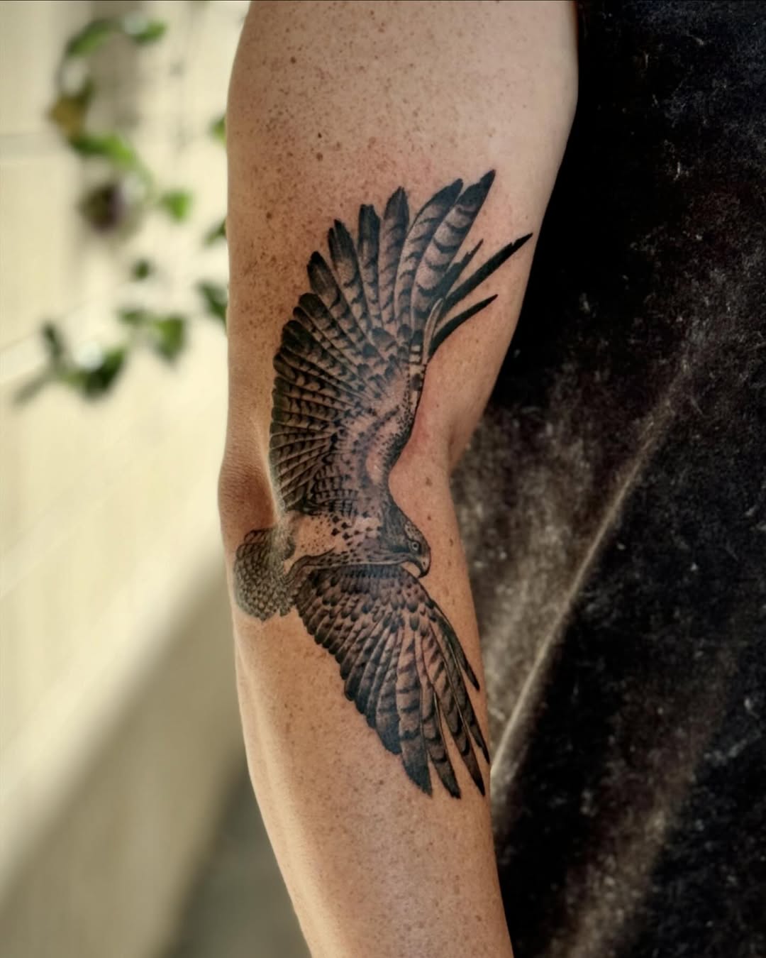 Realistic hawk tattoo showcasing freedom and power