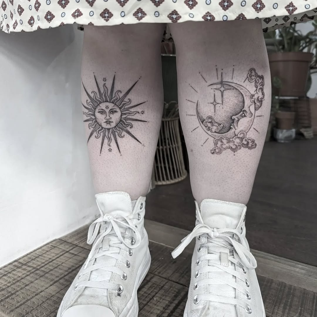 Elegant sun and moon tattoo pair on legs