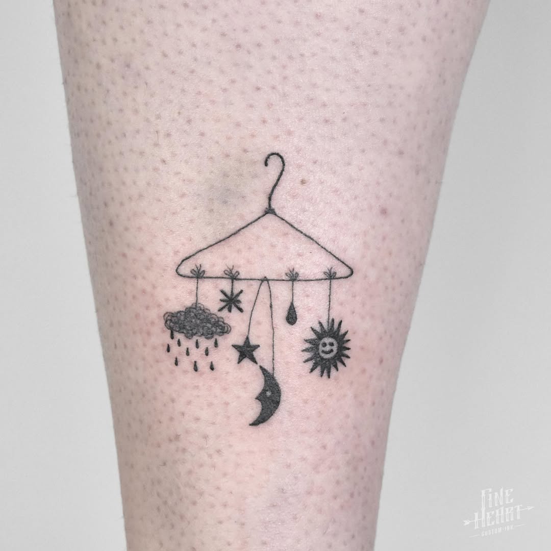 Charming mobile of sun and moon elements