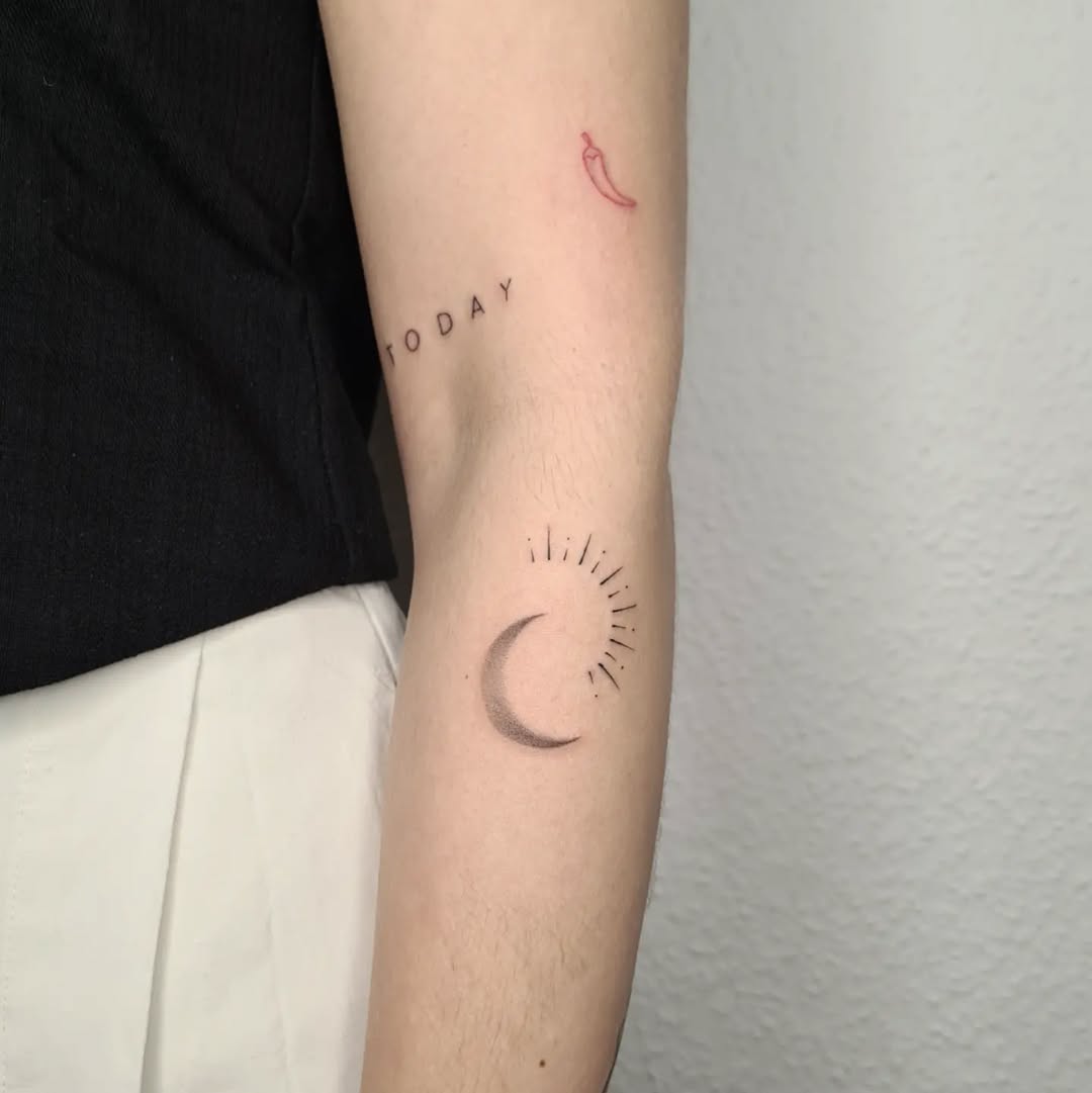 Elegant sun and moon tattoo combination