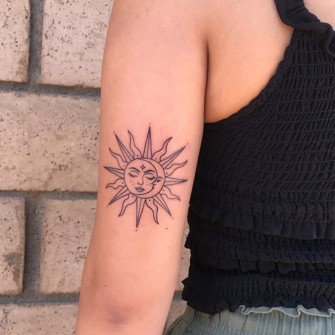 Beautiful sun tattoo radiating positivity and light