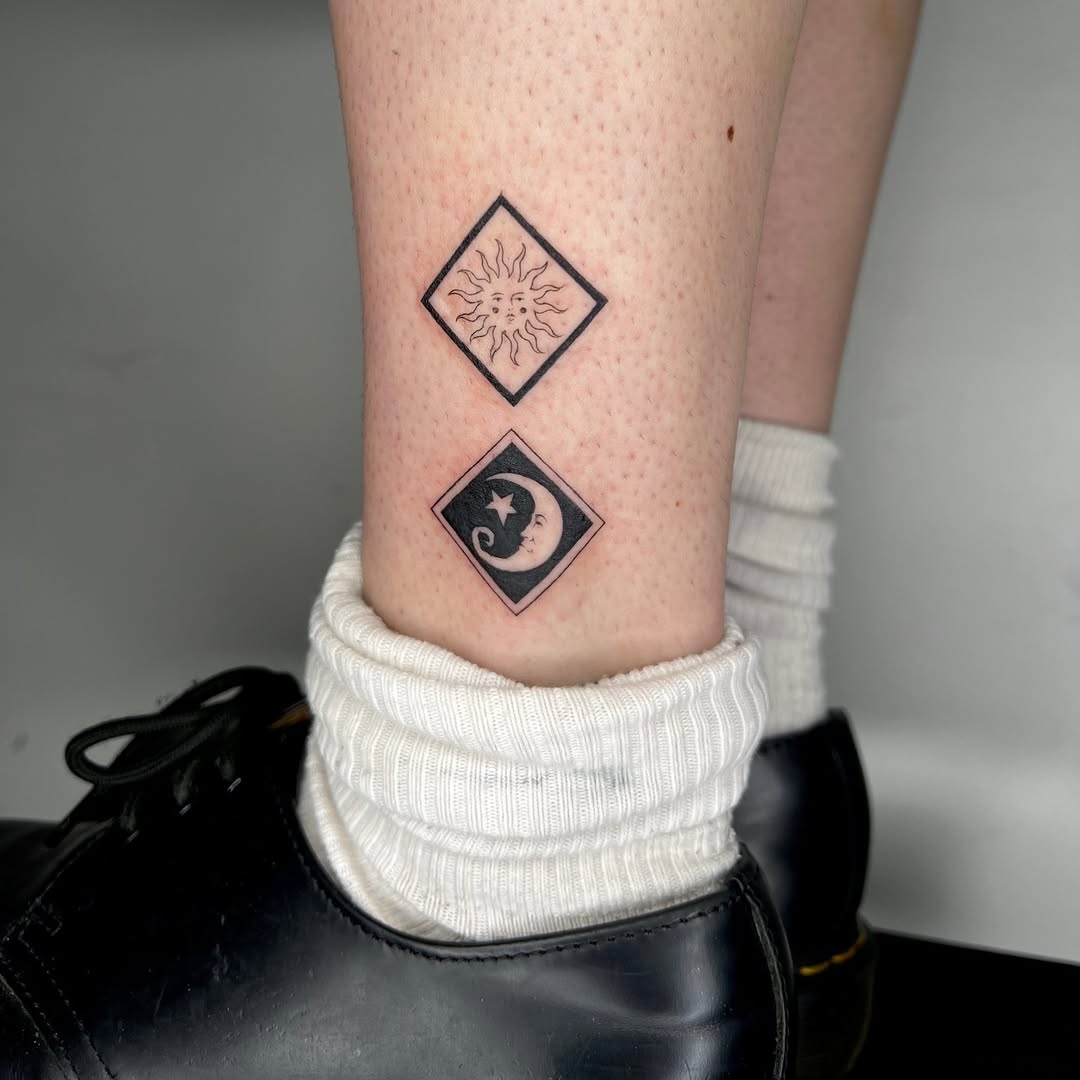 Stylish sun and moon tattoo design