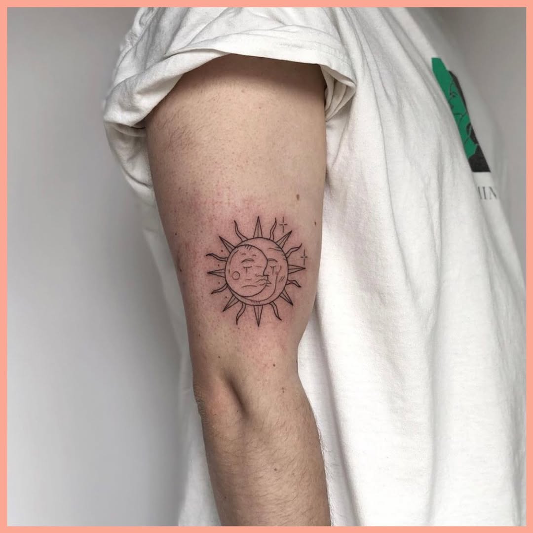 Intricate sun and moon tattoo on arm