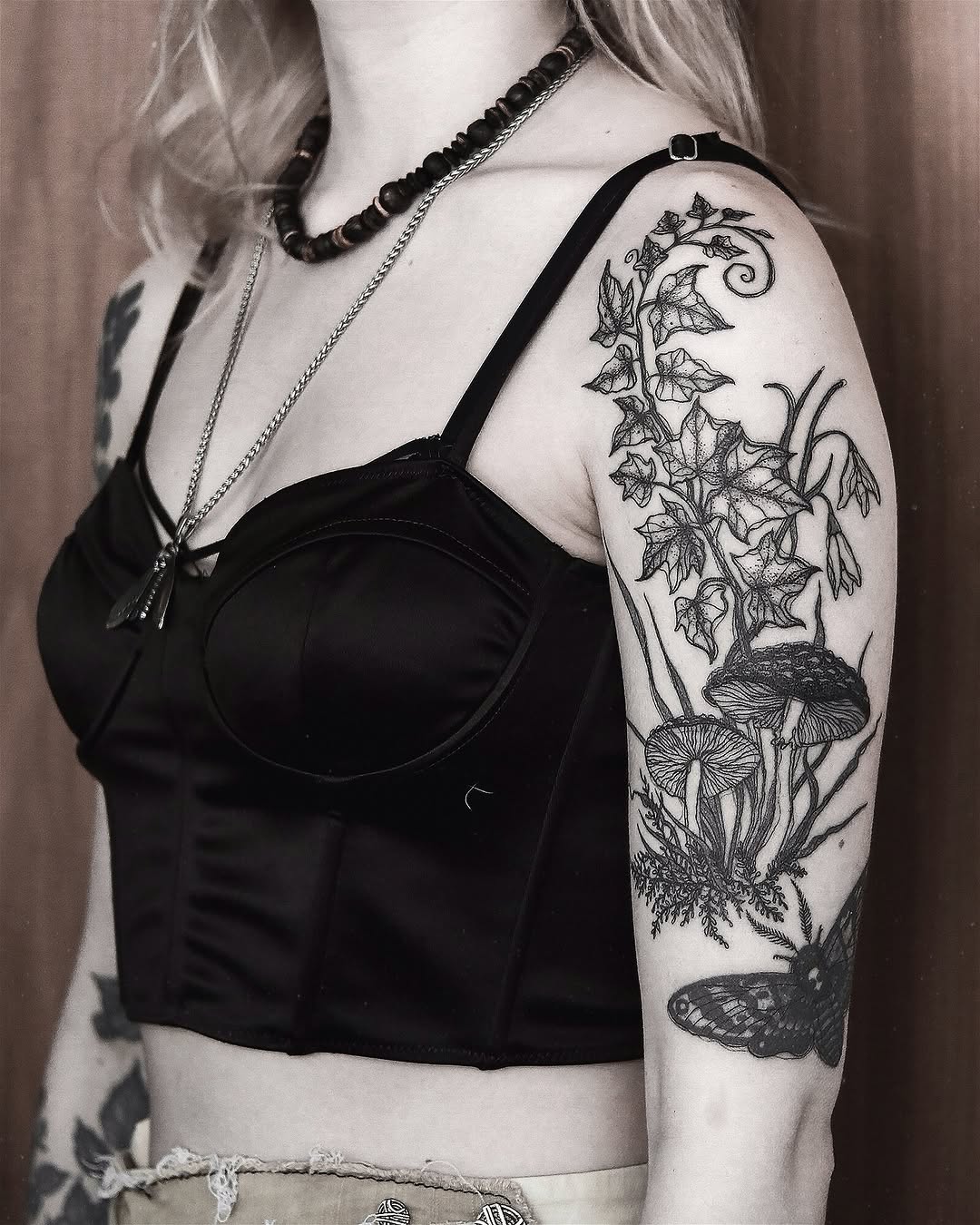 Intricate Flora and Fauna Tattoo Design