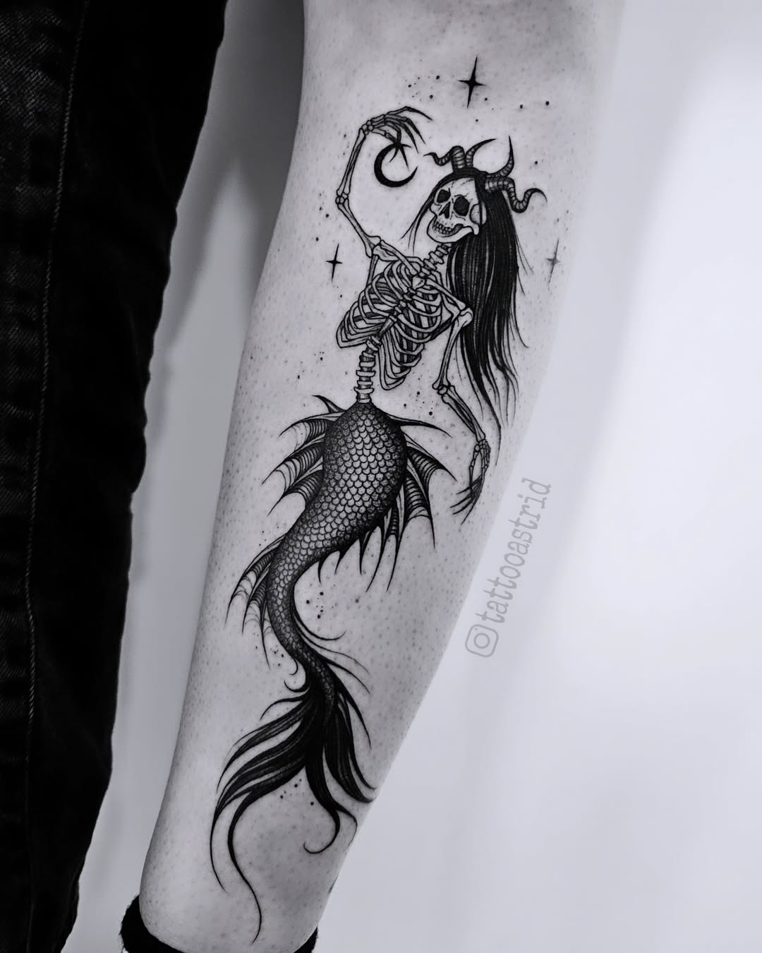 Eerie Skeleton-Mermaid Tattoo with Mystical Vibes