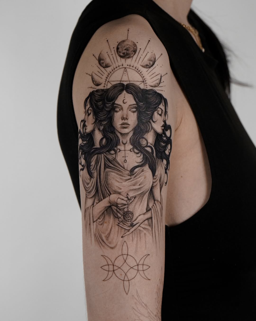 Enchanting feminine witchy tattoo with moons