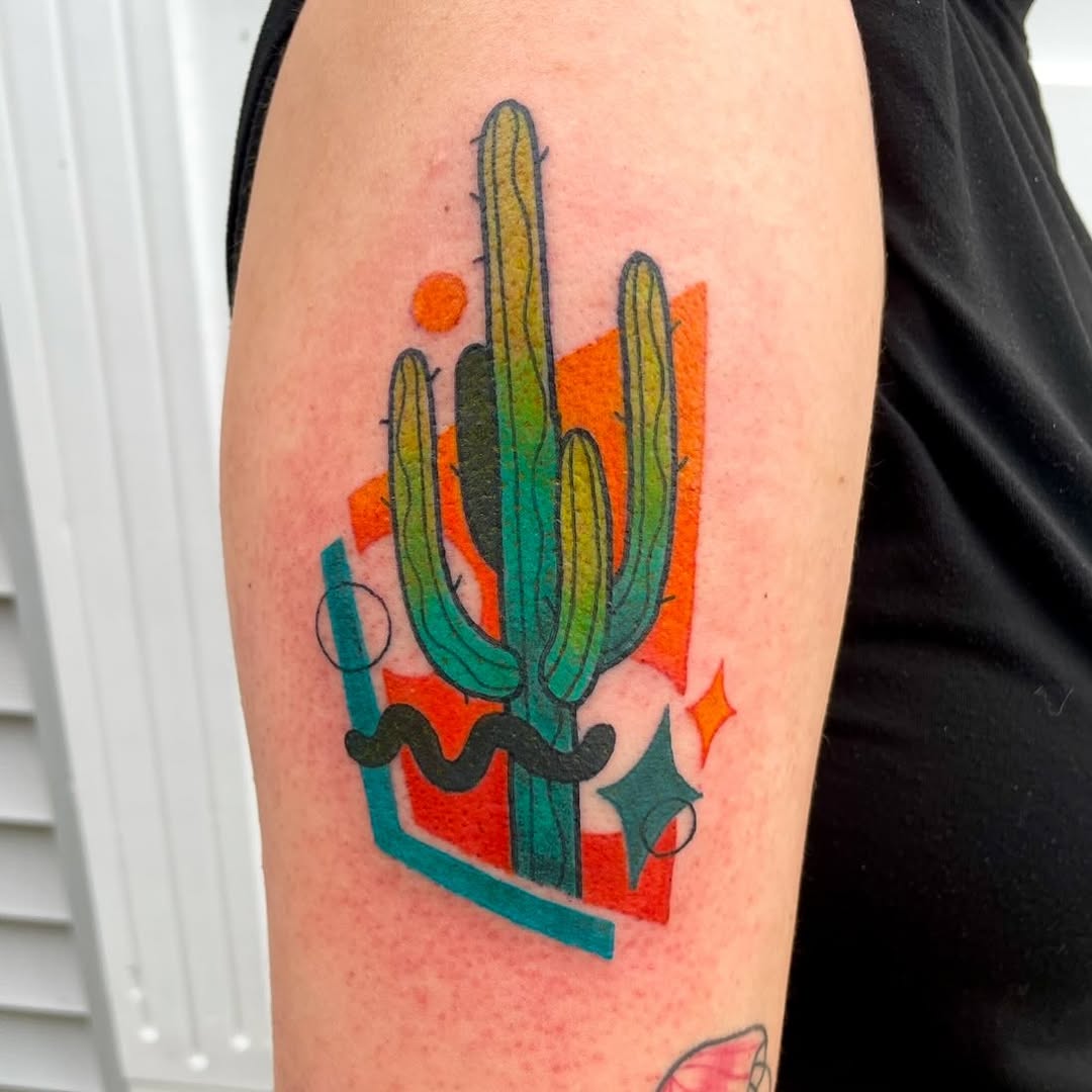 Vibrant cactus tattoo with geometric elements