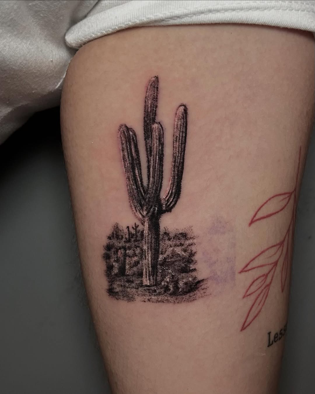 Artistic depiction of a cactus tattoo