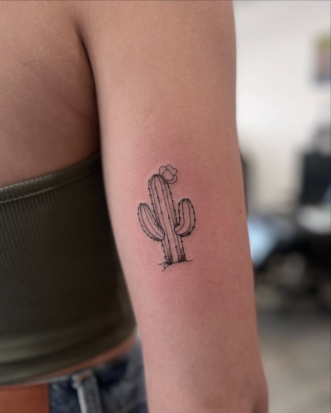 Charming cactus tattoo for a unique aesthetic