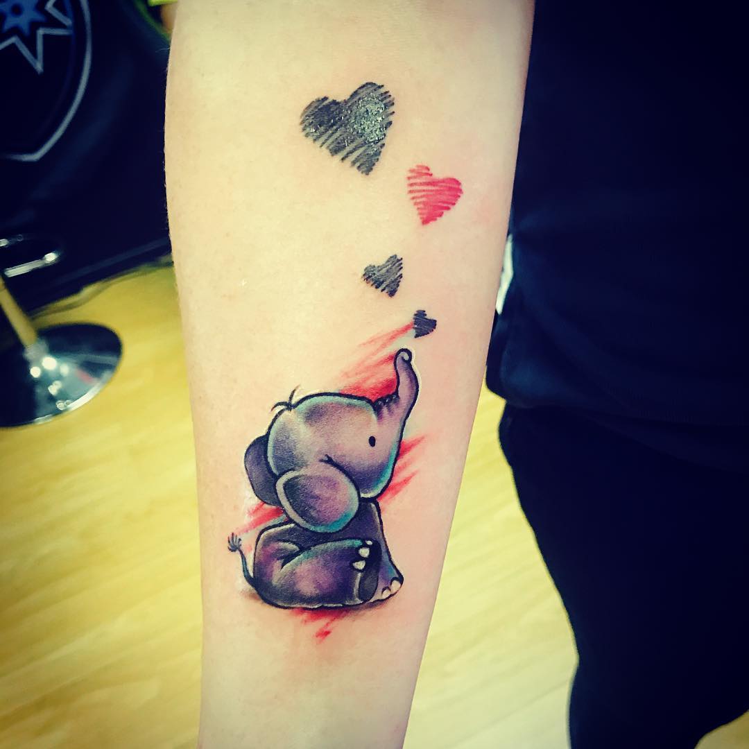 Charming Elephant Tattoo with Heart Accents