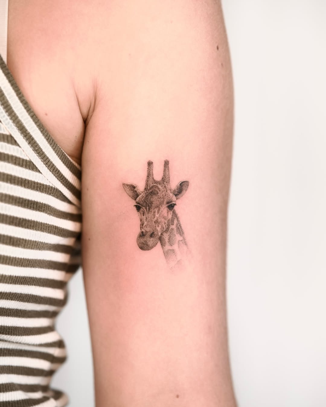 Stylish Giraffe Tattoo with Realistic Detail