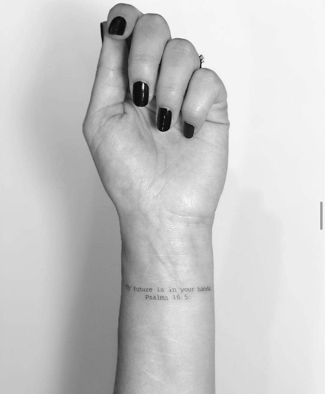 Meaningful quote tattoo on elegant wrist