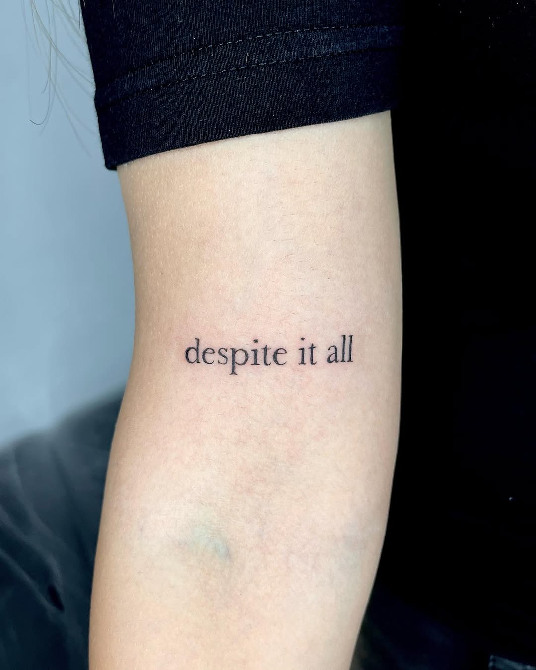 Minimalist tattoo with a powerful message
