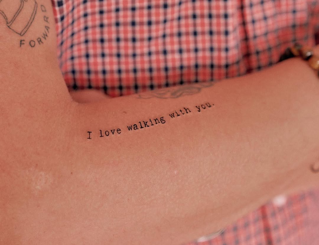 Minimalistic quote tattoo expressing love