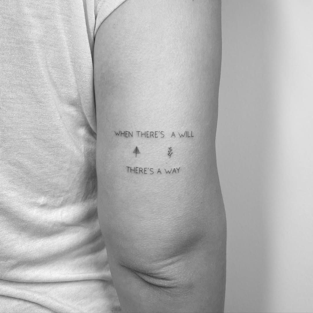 Inspirational quote tattoo with nature symbols