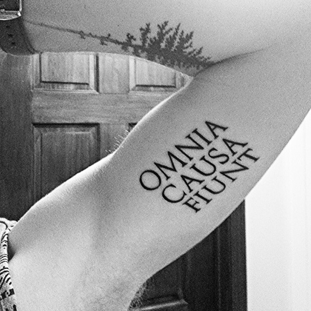 Stylish Quote Tattoo on Upper Arm